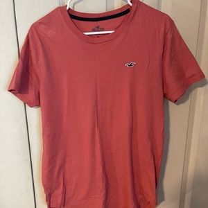 Hollister T shirt, salmon color, size small.